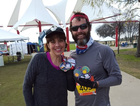 A picture of Mike and his wife after completing the New Year's Double Double race.